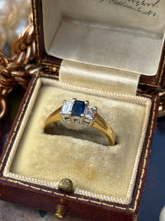 Emerald Cut Sapphire and Diamond Ring in 18K Gold – A Classic Blend of Sophistication and Sparkle